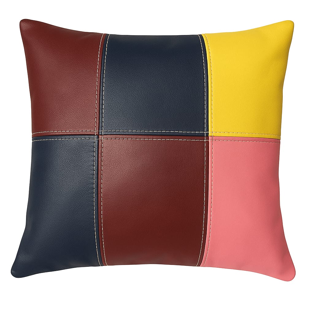 Multicolored pillow with a patchwork design on a white background
